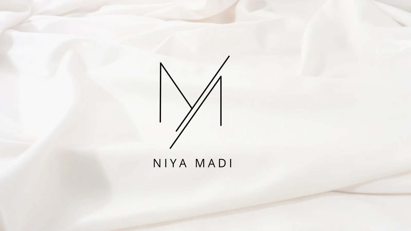 The Niya Madi primary monogram and wordmark