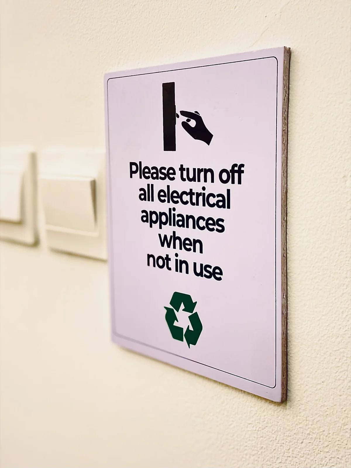 Sign reading please turn off all electrical appliances when not in use